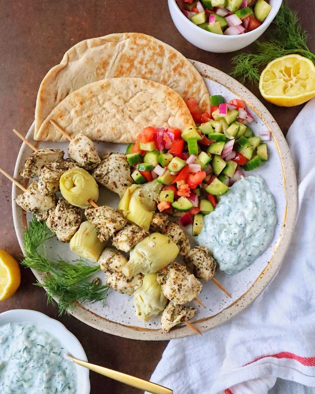 Za'atar Chicken Skewers with Tzatziki and Tomato Cucumber Salad